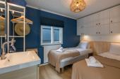 Slaapkamer met aparte bedden