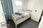 Slaapkamer met eenpersoonsbed