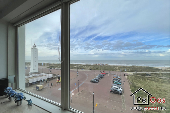 Branding, vuurtoren en strand