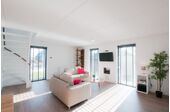 Open woonkamer licht gestyled voor optimaal relaxen
