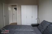 Bedroom with double bed and wardrobe
