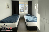 Slaapkamer met eenpersoonsbedden
