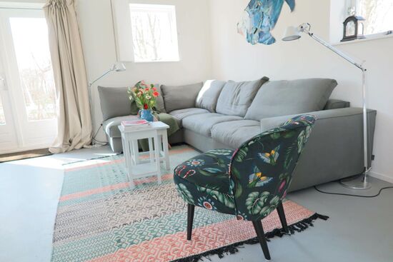 Spacious living room with patio doors