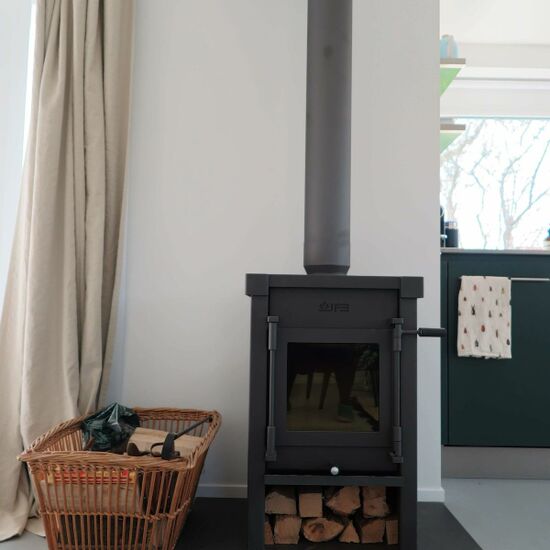 The wood stove provides atmosphere and warmth