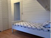 slaapkamer met aparte bedden